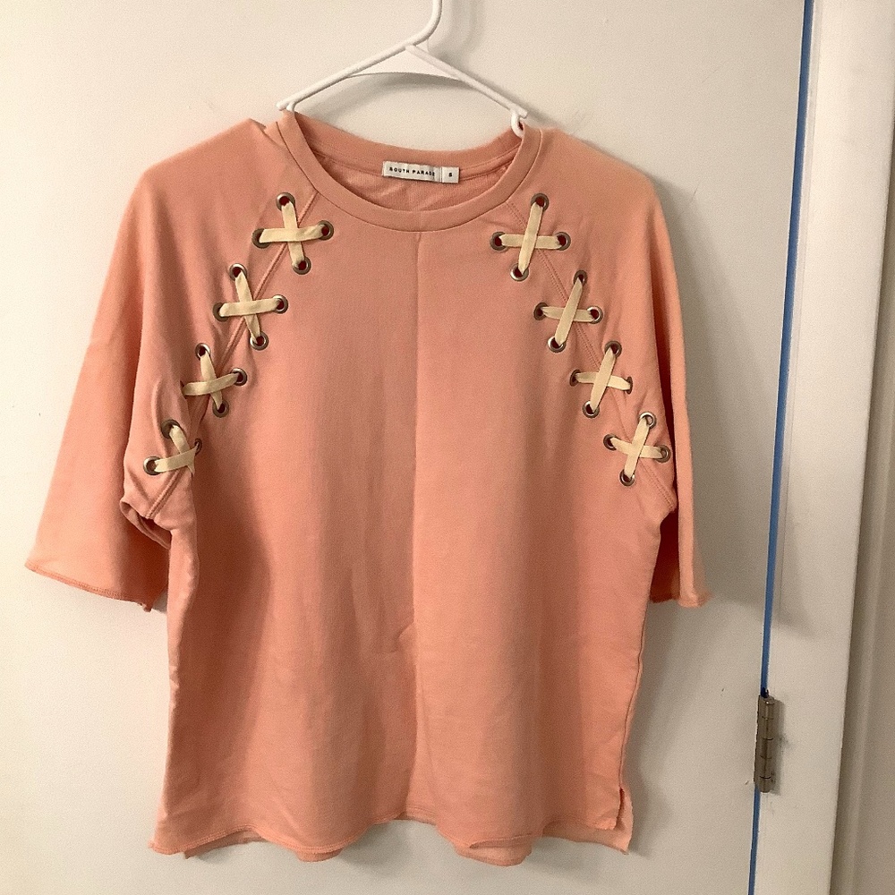 South paraded pink T